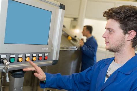 Worker Operating Machine In Factory Stock Image Image Of Computer