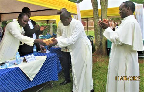 Rev Fr Denis Ssebuggwaawo The Kasana Cathedral Administrator Hands