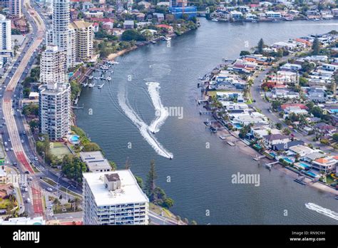 Jet Ski Speeding On Nerang River Among Luxury Real Estate Of Gold Coast