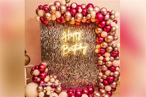 A Breathtaking Pink And Silver Neon Lights Decor With Sequin Wall