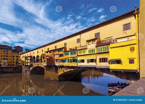 Ponte Vecchio Bridge Crossing The Arno River In Florence UNESCO Stock