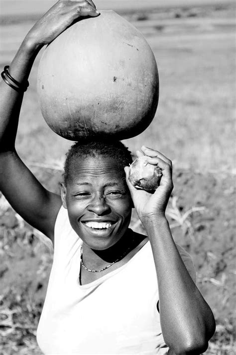 A Old African Woman Smiles With A Toothless Grin Stock Photo Image Of