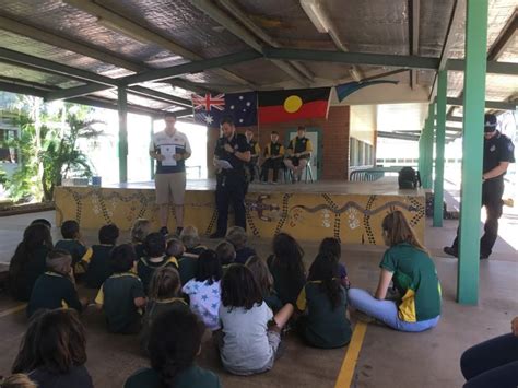 Principal David Hardy and Officer Lincoln addressing the students