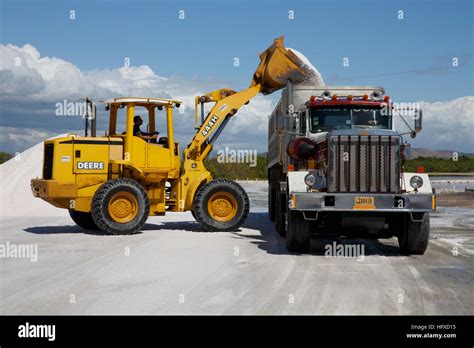 Loading salt onto a truck Stock Photo - Alamy