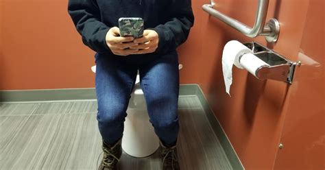 Experts Say Bringing Your Phone To The Bathroom May Be Making You Sick