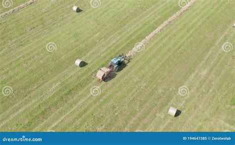 Blue Tractor Hay Bales Aerial View Stock Video Video Of Flying