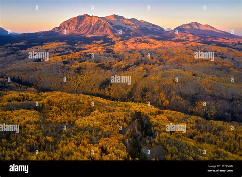 An Aerial Landscape View Of Two Distant Mountain Ranges With A