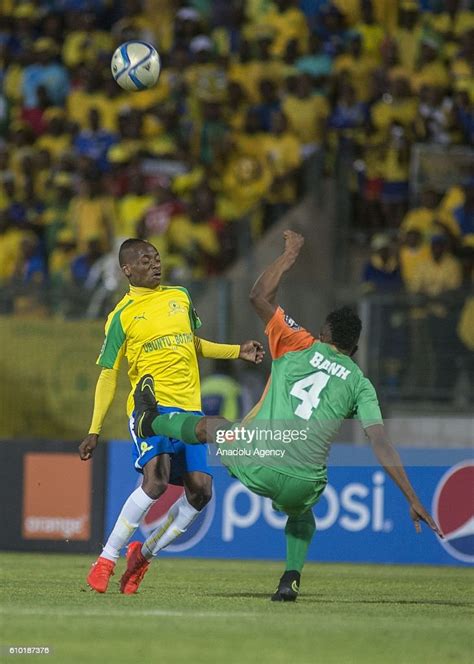 Adama Bahn Of Zesco United Fc In Action Against Khama Billiat Of