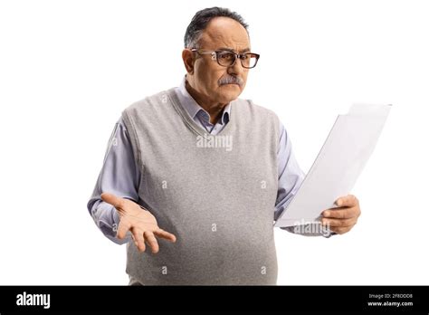 Confused Mature Man Holding A Paper Document Isolated On White
