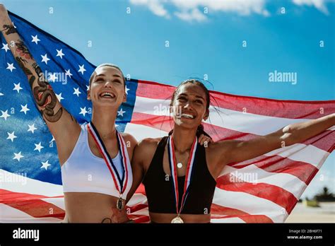 Happy Multiracial Athletes Celebrating Victory Hi Res Stock Photography