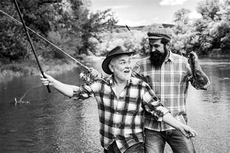 Portrait Of Cheerful Two Bearded Men Fishing Fishermen Fishing