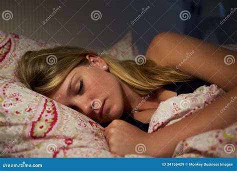 Teenage Girl Asleep In Bed At Night Royalty Free Stock Images Image 34156429