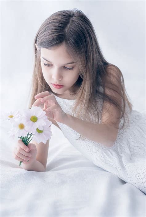 Close Up Portrait Of A Beautiful Caucasian Girl In A White Dress Stock Photo Image Of Blonde