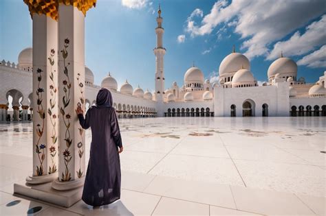 Premium Photo Woman With Traditional Dress Inside Sheikh Zayed Mosque