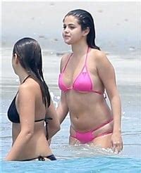 Selena Gomez Stuffs Her Fat Ass Into A Bikini