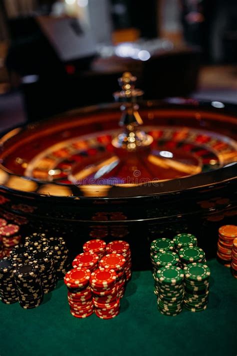 Gambling Table and Roulette Wheel in Casino. Stock Photo - Image of ...