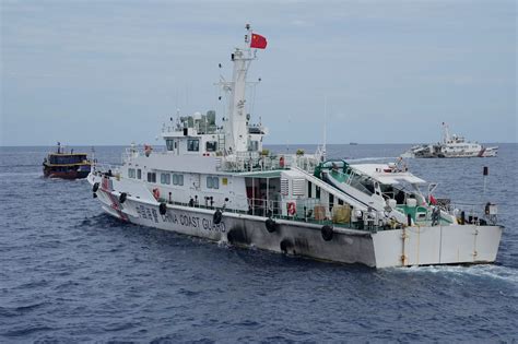 Philippine Coast Guard Removes Barrier Placed By China In Disputed