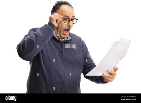 Shocked Mature Man Looking At A Document Isolated On White Background