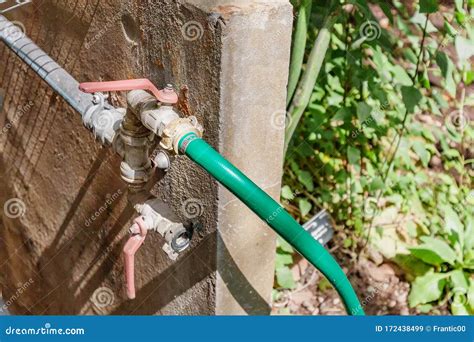Garden Hose With Faucet In Greenhouse Stock Image Image Of Lead