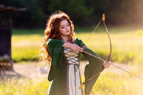 Mysterious Red Haired Warrior Girl Stands Lady Elven Princess Holds