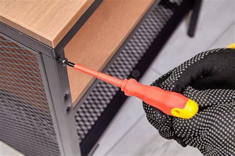 Diy Assembling A Piece Of Flat Box Furniture At Home Stock Image