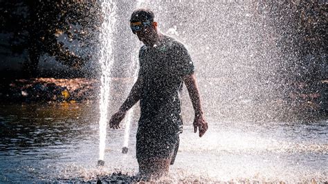 Man in Water Fountain · Free Stock Photo