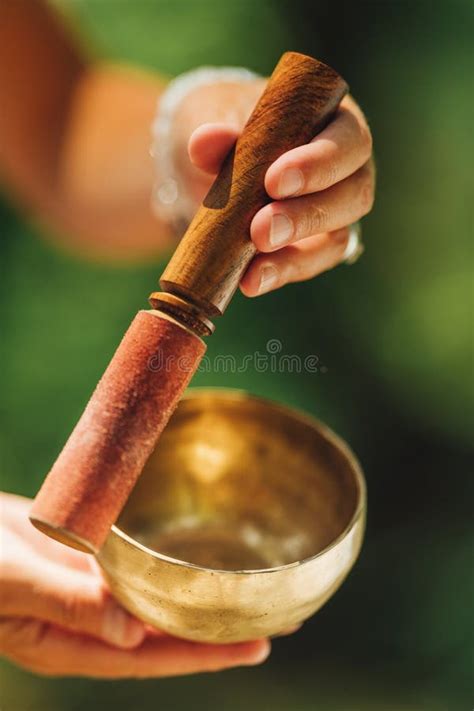 Hands Holding Tibetan Singing Bowl Outdoors Stock Photo Image Of