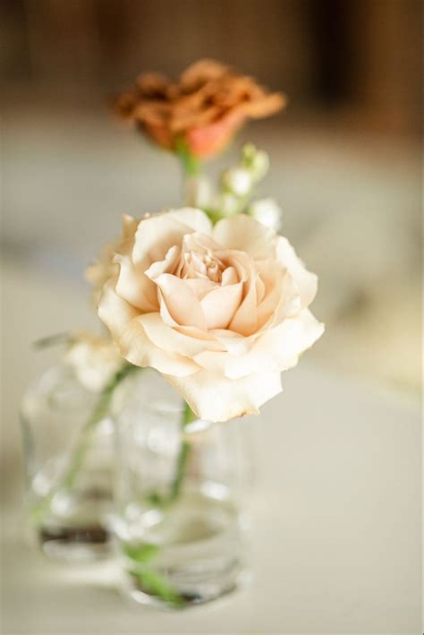 stunning boho wedding centerpiece  reflexed roses