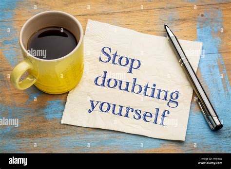 Stop Doubting Yourself Handwriting On A Napkin With A Cup Of Espresso