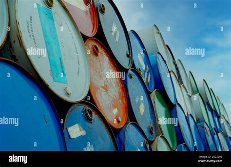 Old Chemical Barrels Stack Blue And Red Oil Drum Steel Oil Tank