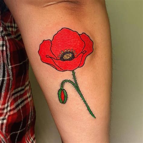 Hand Poked Poppy Flower Tattoo Located On The Forearm