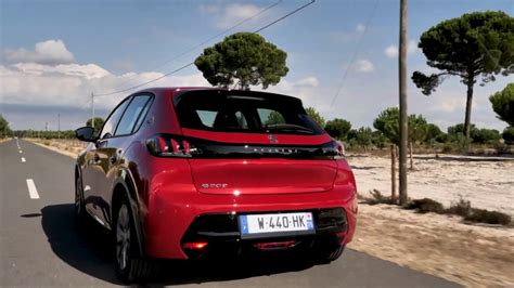 The New Peugeot E 208 Allure In Elixir Red Driving Video Youtube