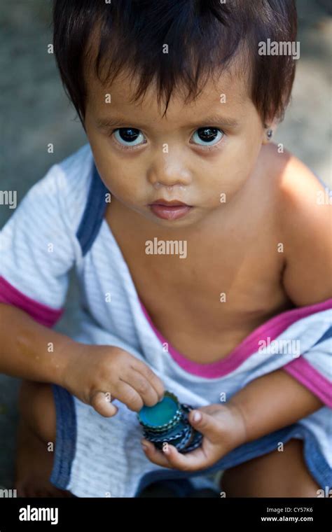 Cute Little Girl In The Old Town Of Manila Philippines Stock Photo Alamy