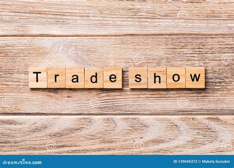 Trade Show Word Written On Wood Block Trade Show Text On Wooden Table