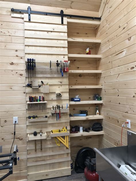 Tool Storage On A French Cleat Barn Door Workshop Layout Workshop