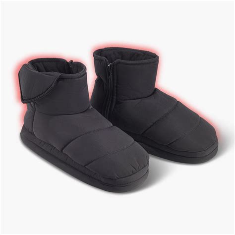 The Indoor/Outdoor Heated Slippers - Hammacher Schlemmer