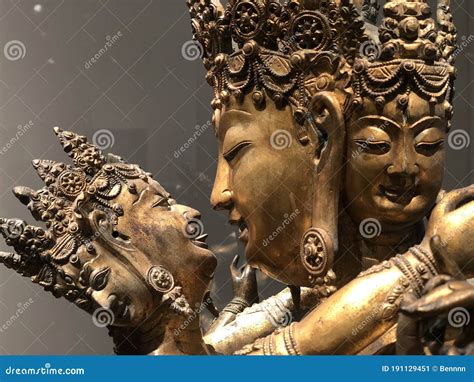 The Gilded Four Armed Form Of Avalokiteshvara Buddha Statue Editorial