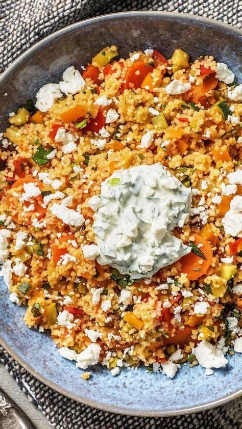 A Bowl Filled With Lots Of Food On Top Of A Table