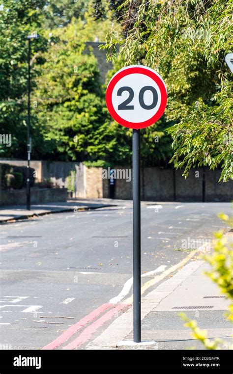 20 Mph Miles Per Hour British Road Speed Limit Sign On Residential