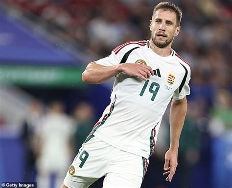Bruised and swollen Hungary player Barnabas Varga is pictured for the ...