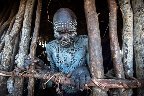 Mursi Tribe Warrior Waking Inside The Hut The Mursi Tribe Flickr