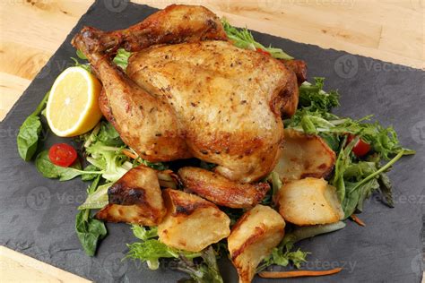 Whole Roasted Grilled Chicken Poultry Bird With Baked Potato Vegetable