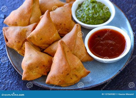 Small Plate of Samosa with Tomato Sauce Stock Photo - Image of fried, samosa: 137569382