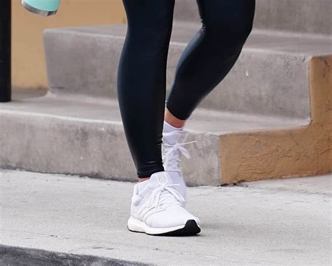 Olivia Wilde Hits The Gym In White Adidas Ultraboost Sneakers In La