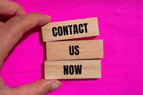 Premium Photo Contact Us Now Words Written On Wooden Blocks With Pink