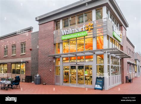 entrance to a Walmart neighborhood market in Bentonville AR, home town of the Walmart ...