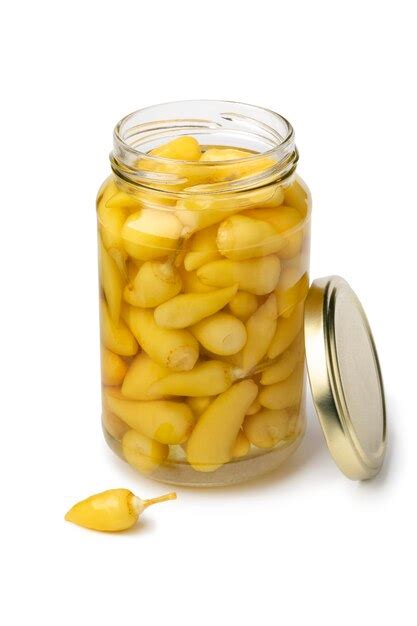 Premium Photo Glass Jar With Small Pickled Yellow Turkish Hot Peppers
