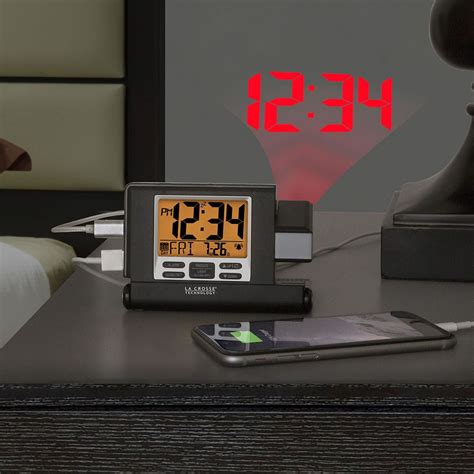 The Travel Projection Alarm Clock Hammacher Schlemmer