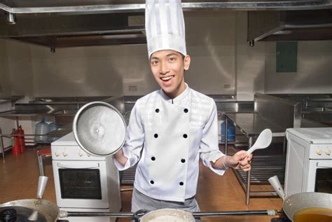 Smiling Chinese Cook In Kitchen Stock Image Image 9726773