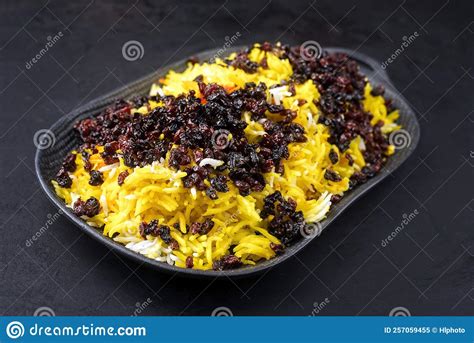 Traditional Persian Steamed Saffron Rice With Berberis On A Cast Iron